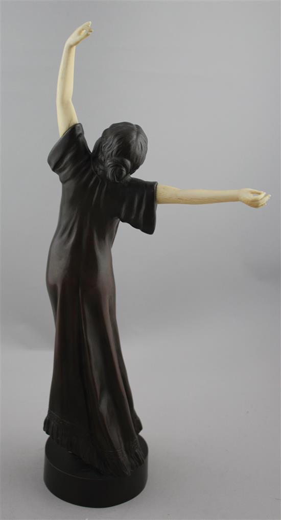 Peter Tereszczuk (Austrian, 1875-1963). A patinated bronze and ivory figure of a young lady dancing, 16.75in.